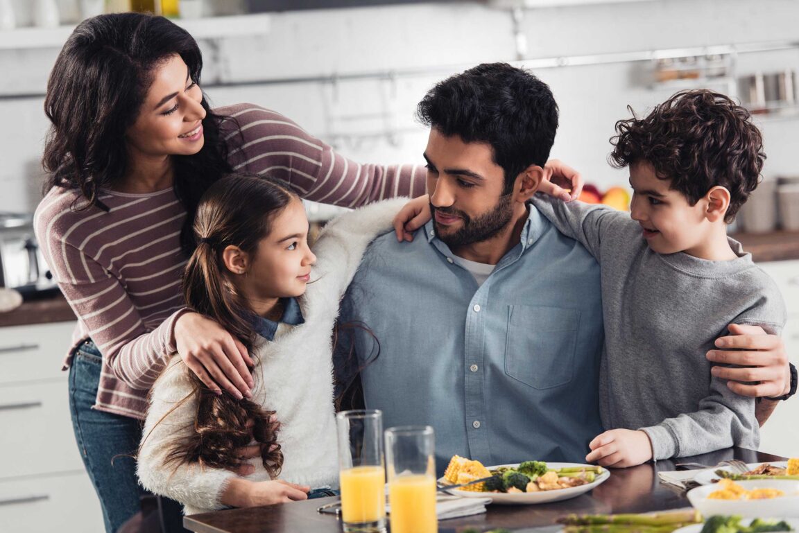 Immigrant family at breakfast